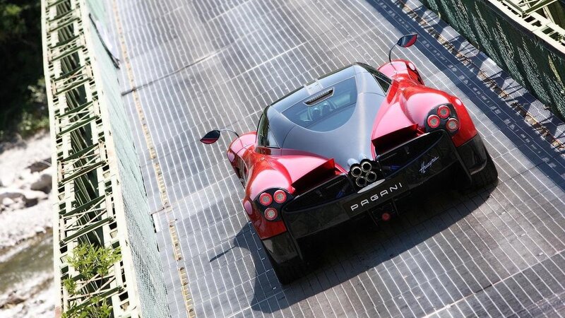 Red Pagani Huayra on a bridge
