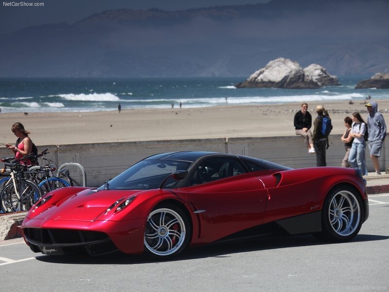 Red Pagani Huayra on beachside street