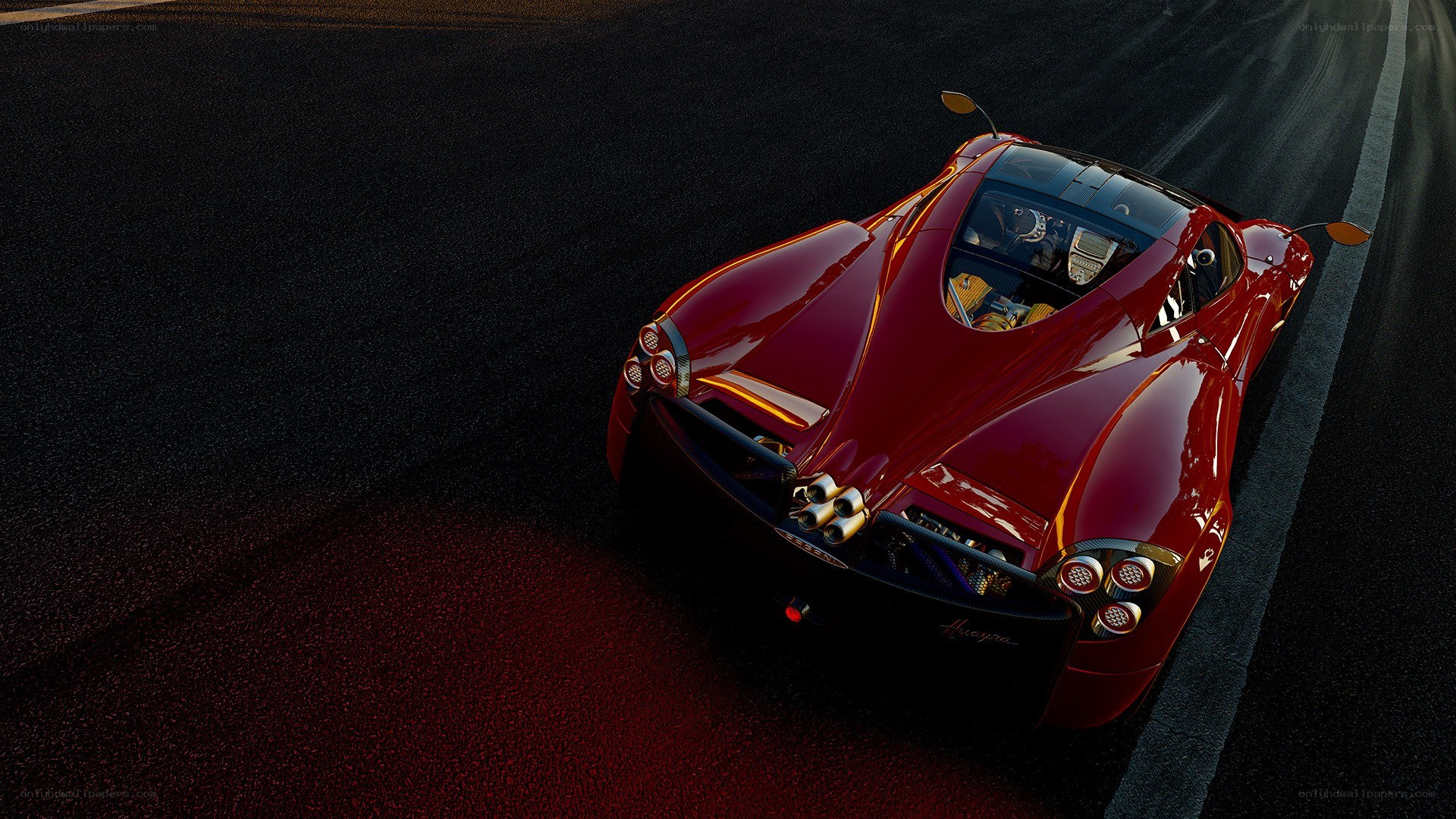 Red Pagani Huayra on racetrack