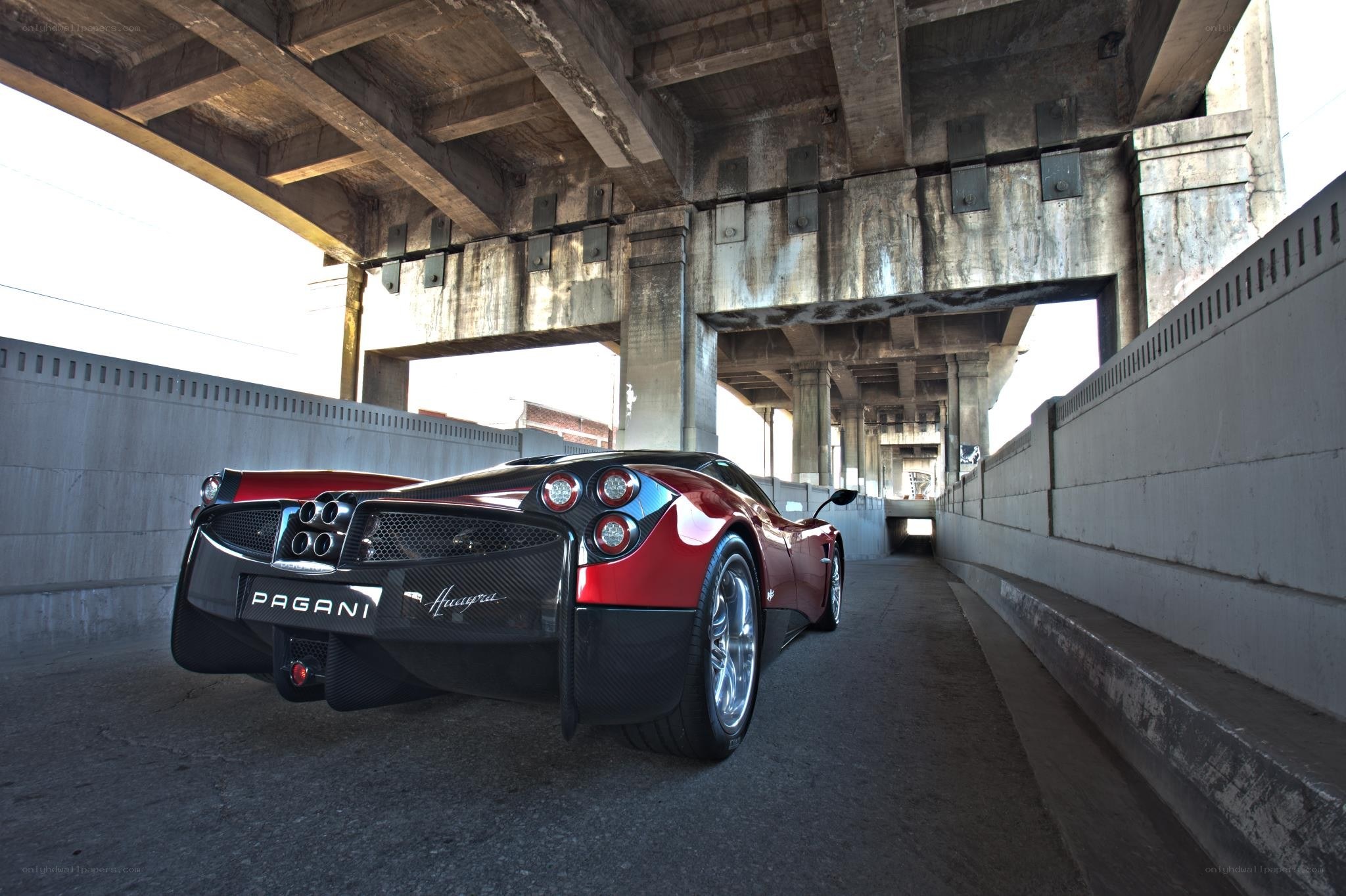 Red Pagani Huayra under bridge