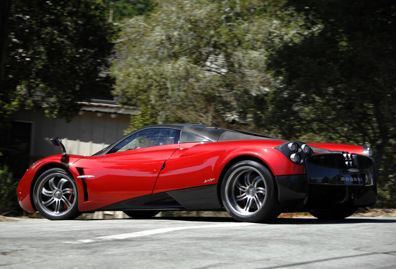 Red Pagani sports car in motion