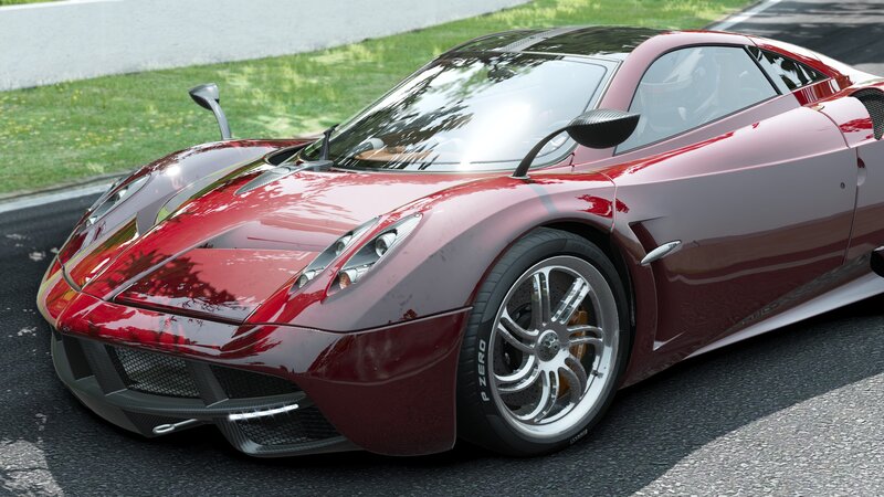 Red Pagani sports car on track