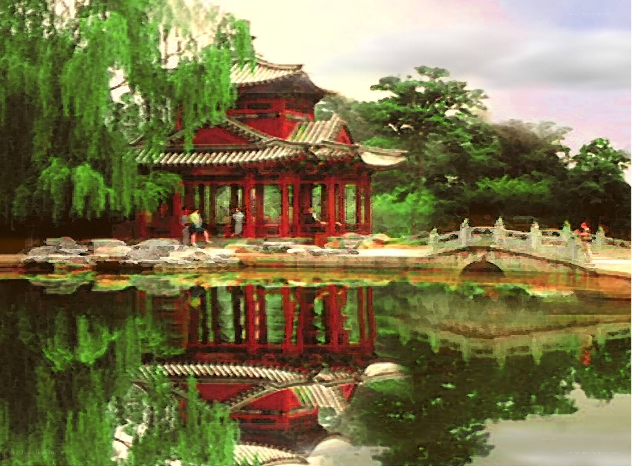 Red pavilion by a pond