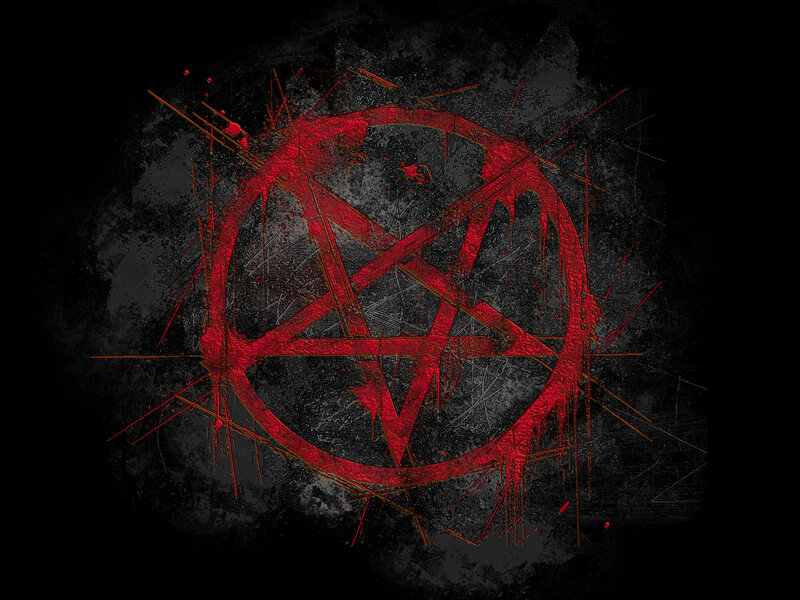 red pentagram on dark background