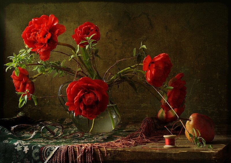 Red peonies in a vase