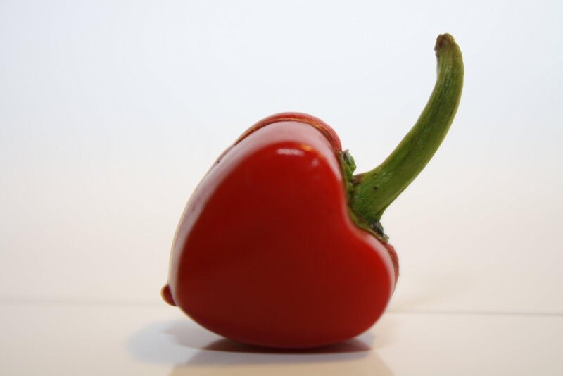 Red Pepper on White Surface — Neutral