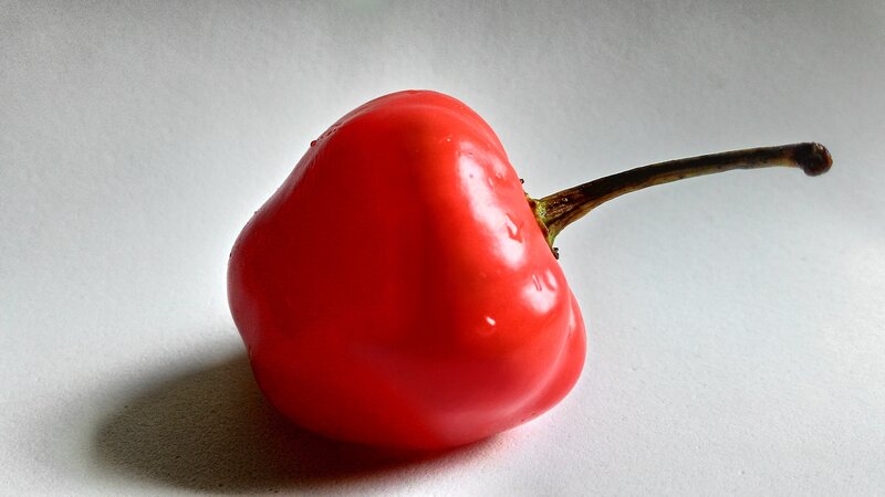 red pepper on white surface