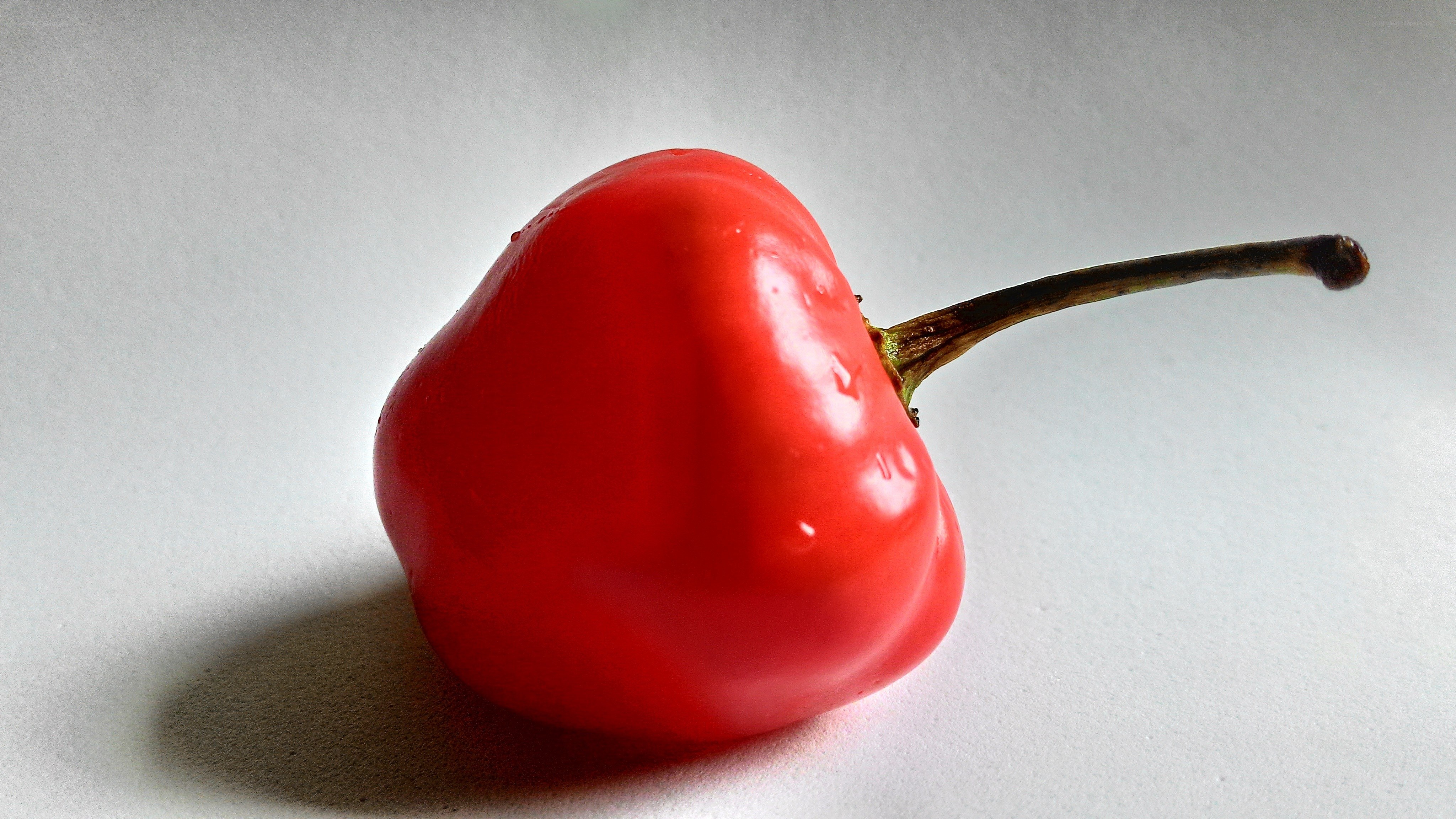 red pepper on white surface