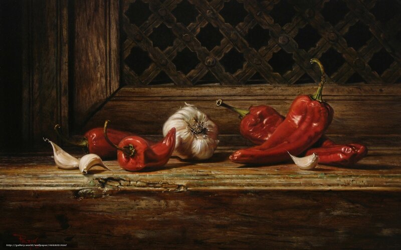 Red peppers and garlic on wood