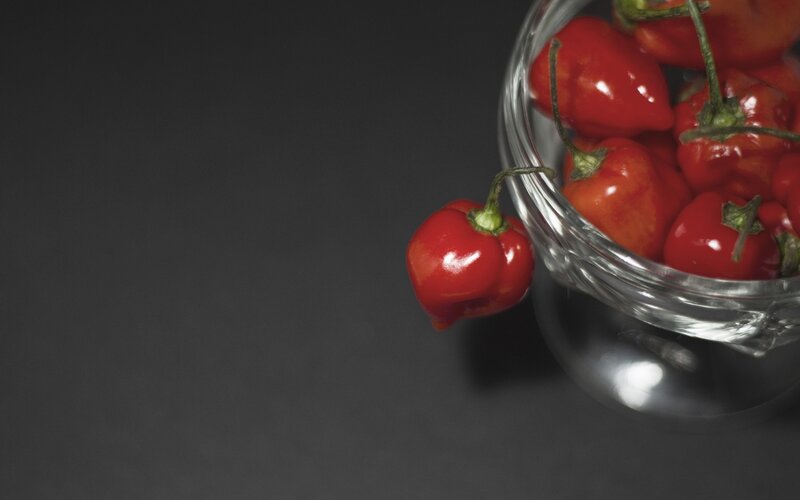 Red peppers in a glass bowl