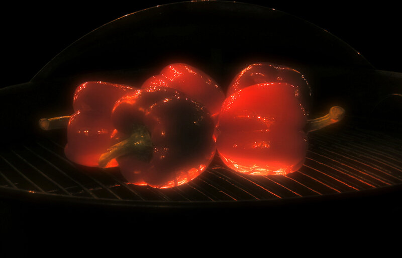 Red peppers on a grill