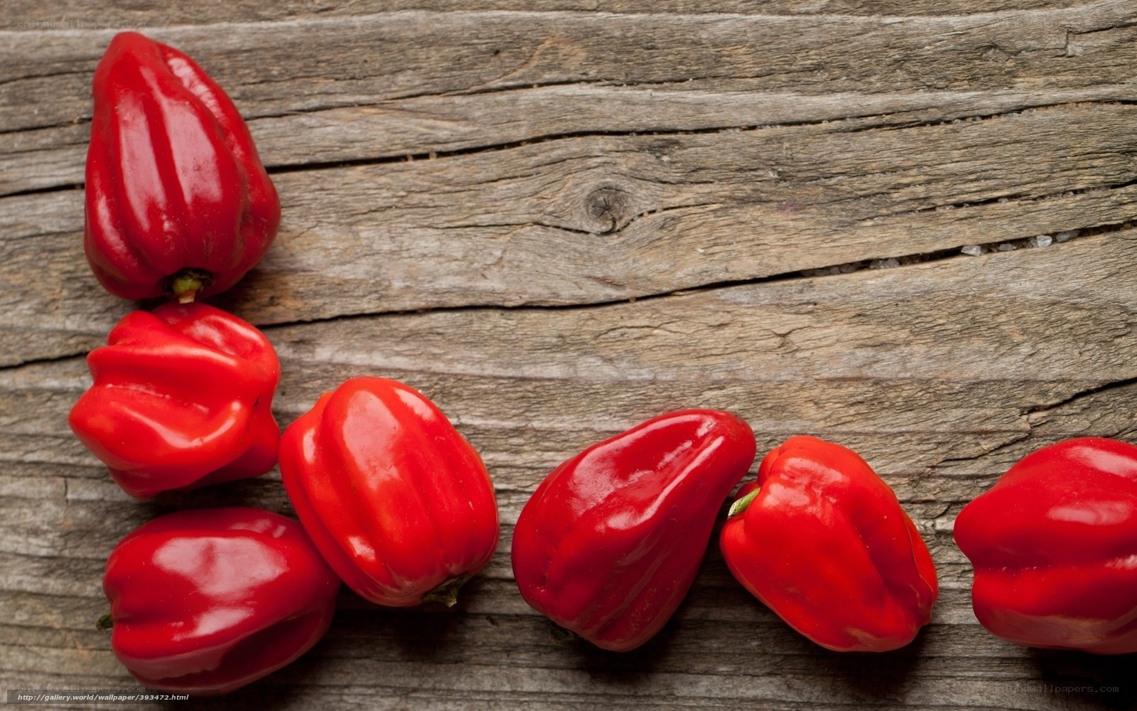 red peppers on wood