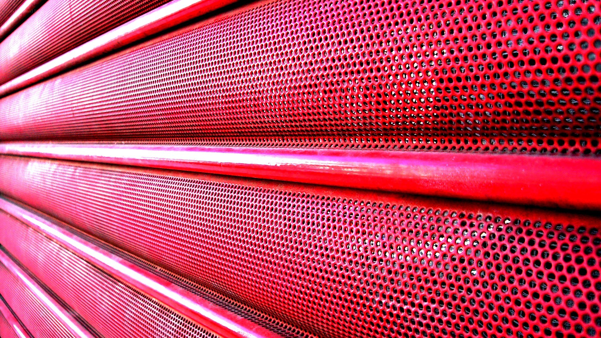 Red perforated metal panels