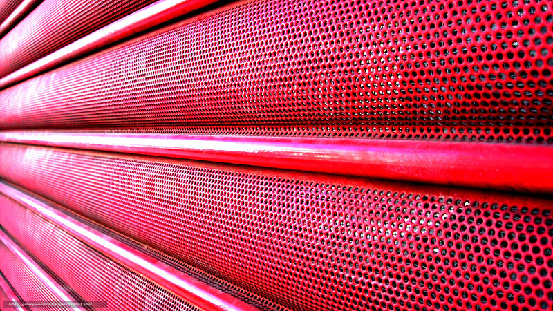 Red perforated metal surface