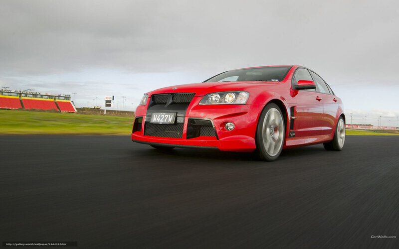 red performance car on racetrack