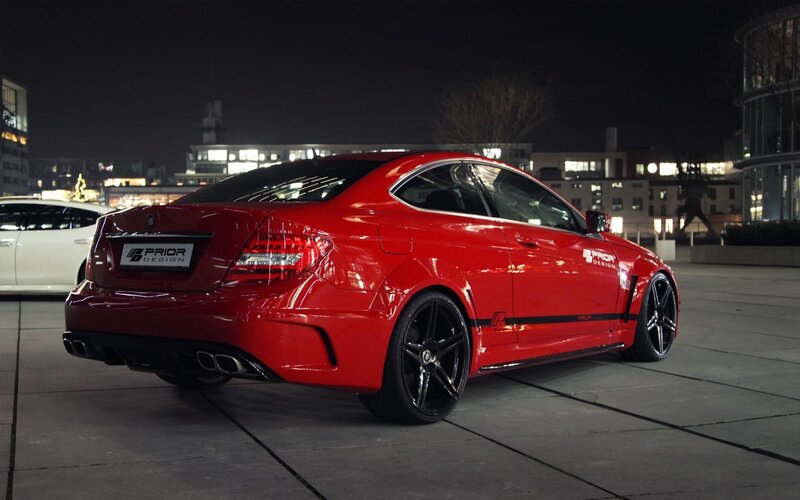 Red performance coupe at night