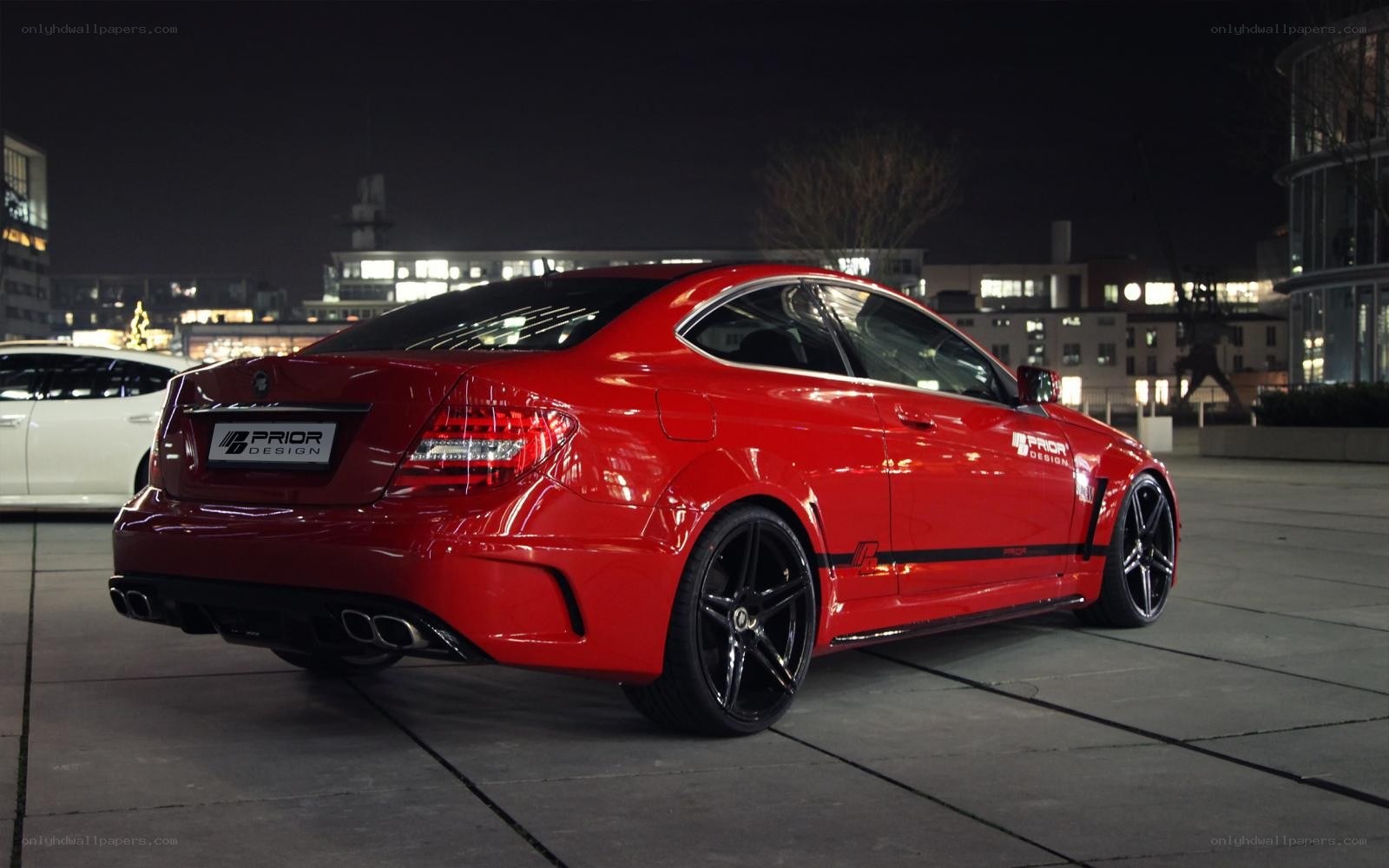 Red performance coupe at night