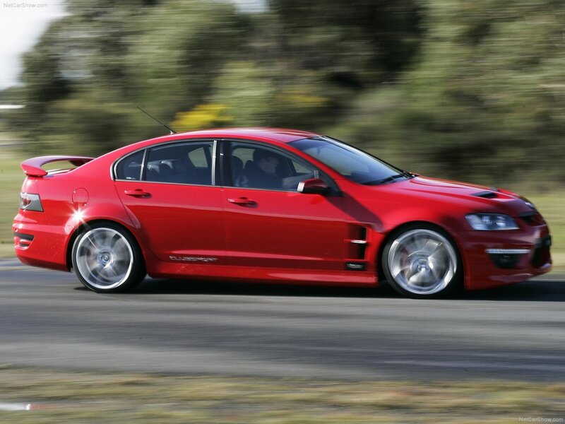 Red Performance Sedan — Dynamic, Afternoon, Photograph, Car