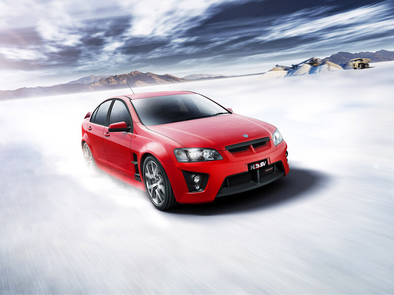 Red Performance Sedan — Dynamic, Photograph, Dusty Terrain
