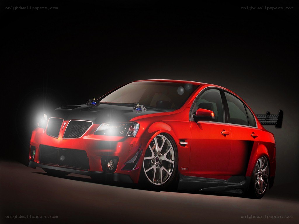 red performance sedan with custom parts