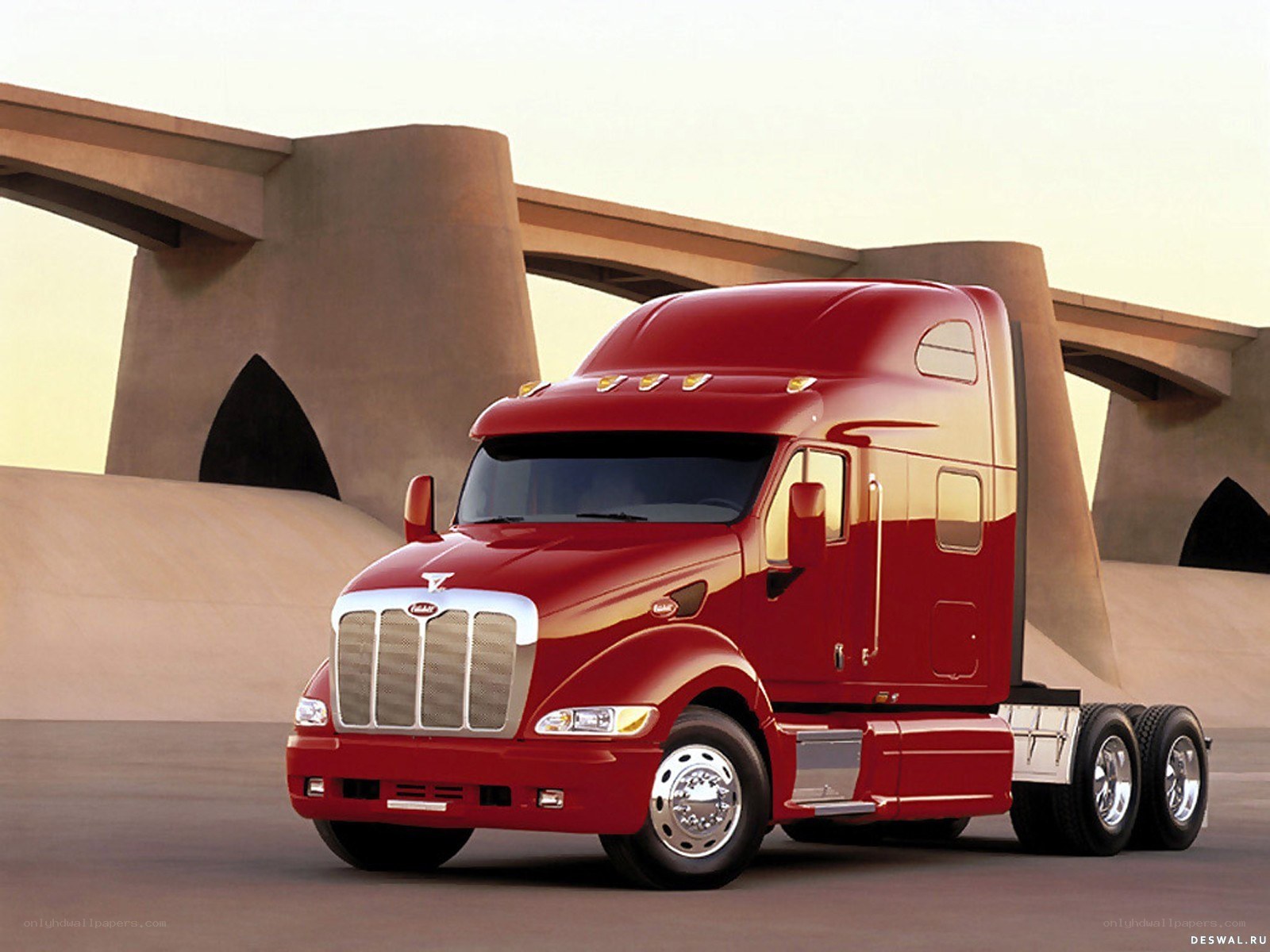 Red Peterbilt truck on road