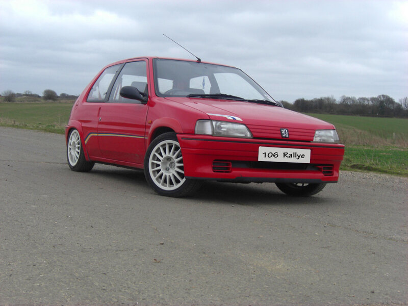 Red Peugeot 106 Rallye