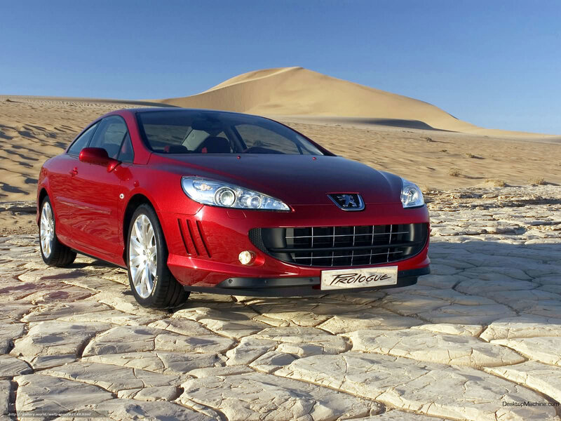 Red Peugeot 307 Coupe in Desert