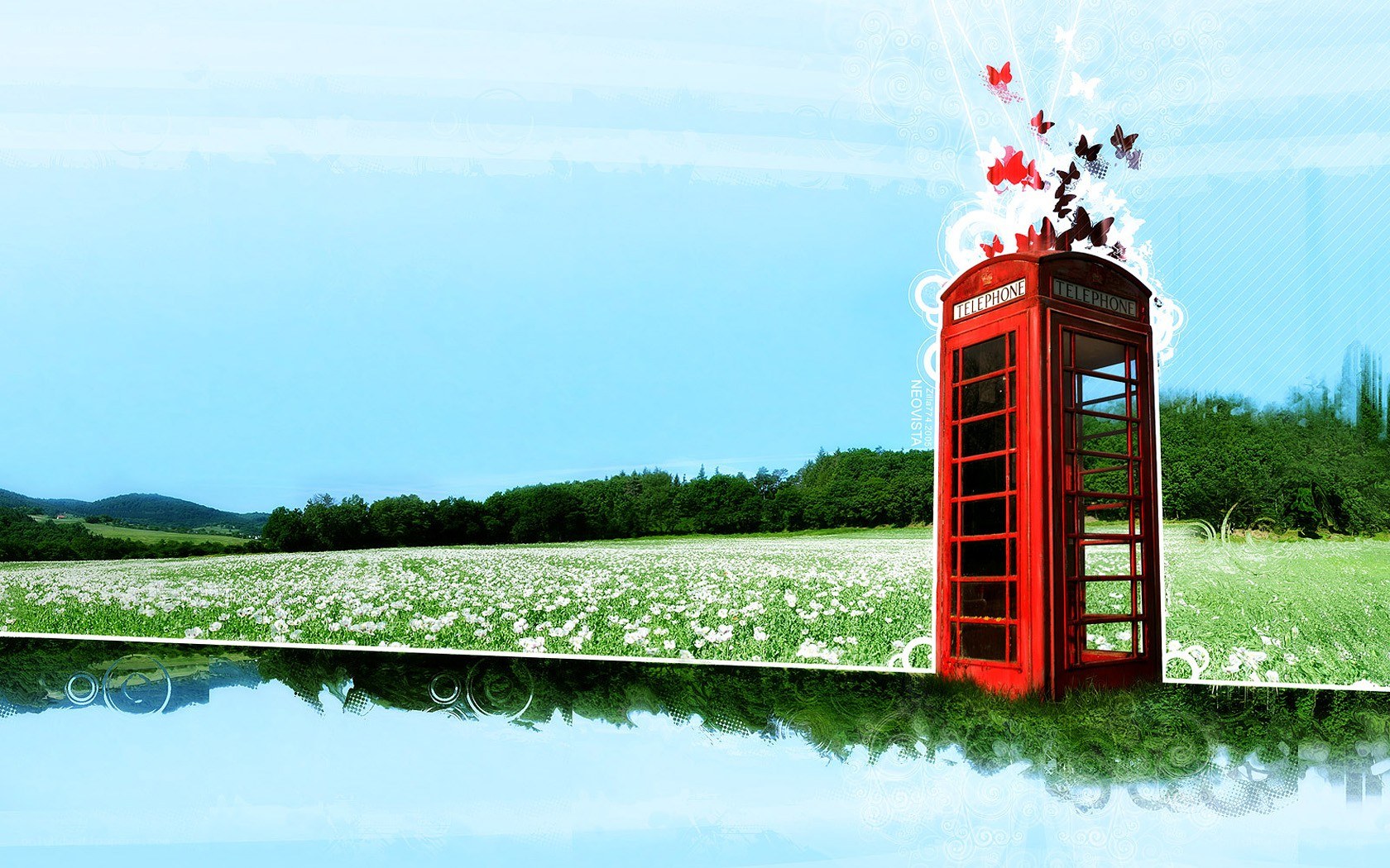 Red phone booth in a field