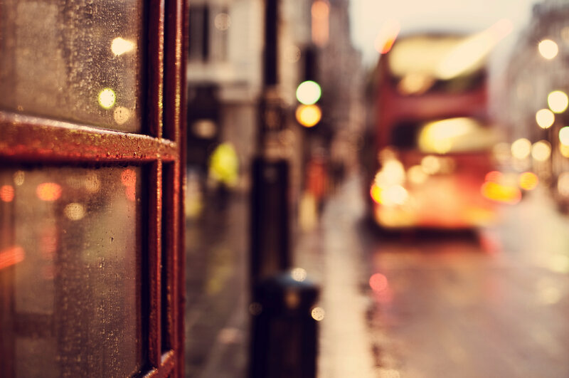 Red Phone Booth in Rain — Moody