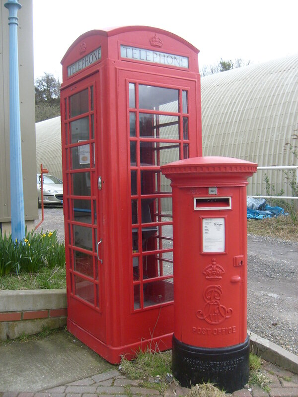 Red phone box and post box