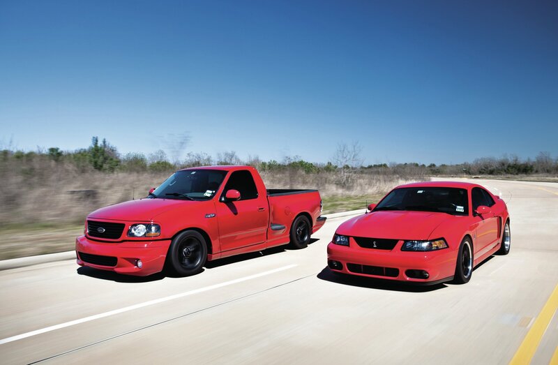 Red Pickup Truck and Car