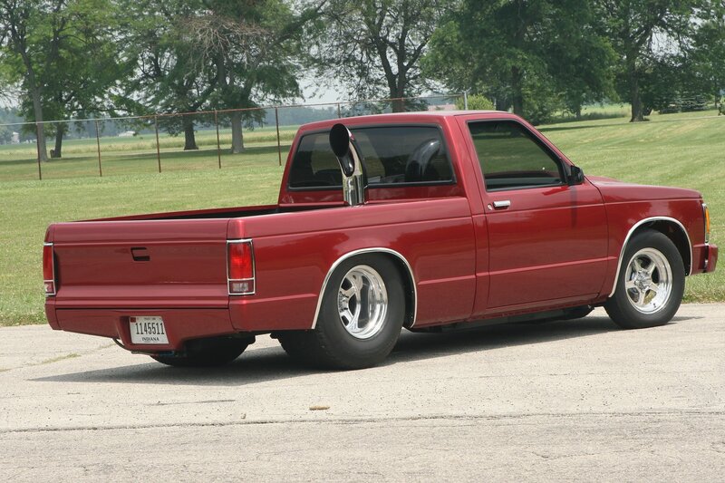 Red Pickup Truck — Calm, Afternoon, Photograph, Grass Field