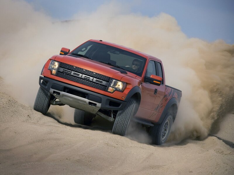 Red Pickup Truck — Dynamic, Afternoon, Photograph, Dust, Driver
