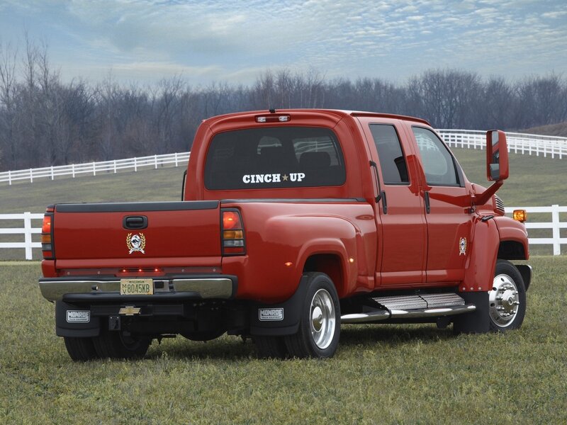 red pickup truck in field