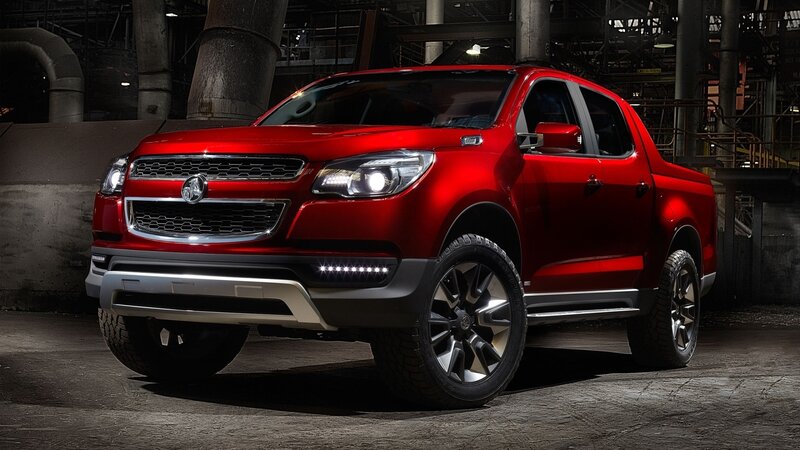 Red pickup truck in industrial setting
