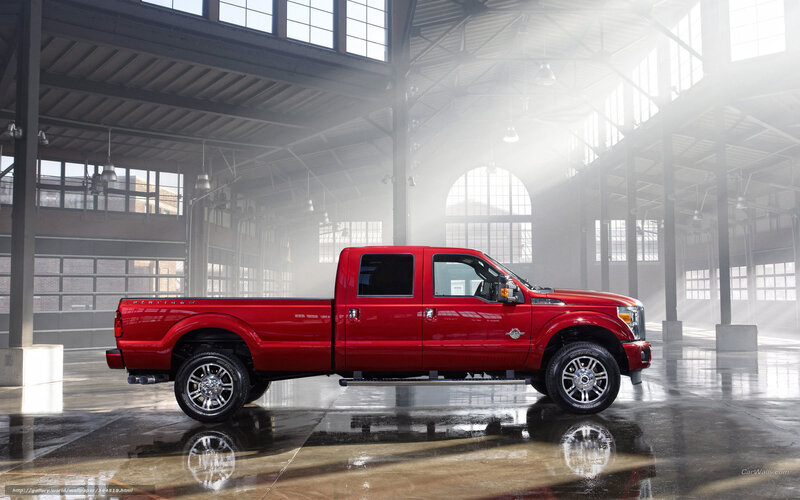 Red pickup truck in warehouse
