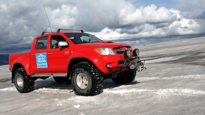 Red Pickup Truck on Ice