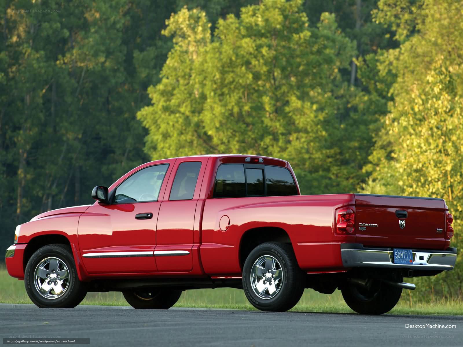Red pickup truck on road