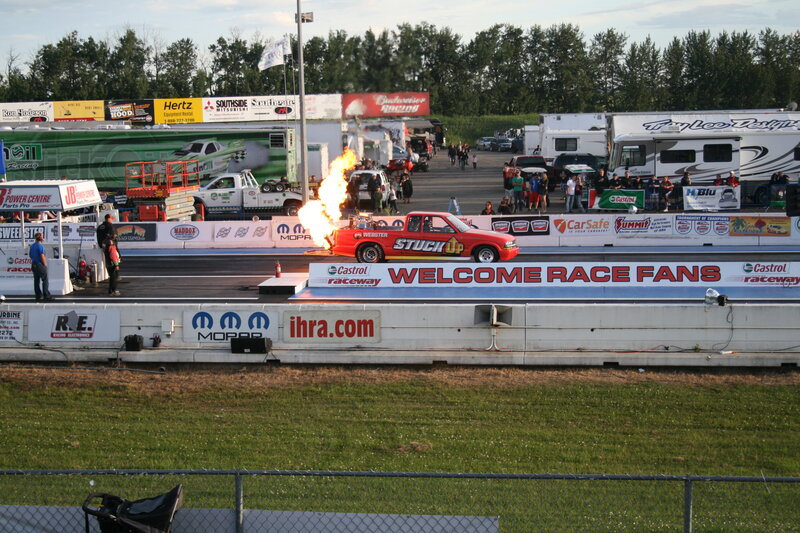 Red Pickup Truck on Track — Energetic