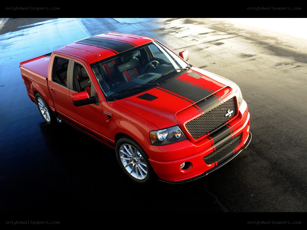 red pickup truck with black stripes