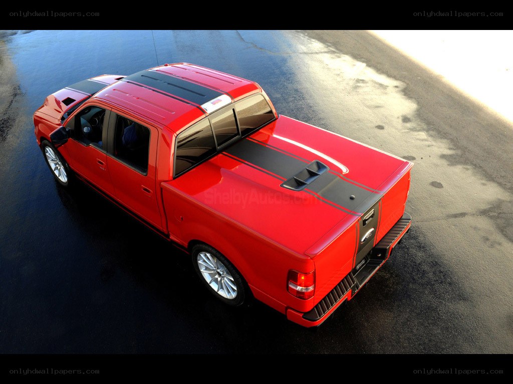 red pickup truck with stripes
