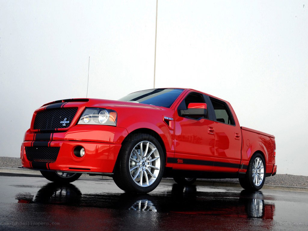 red pickup truck with stripes