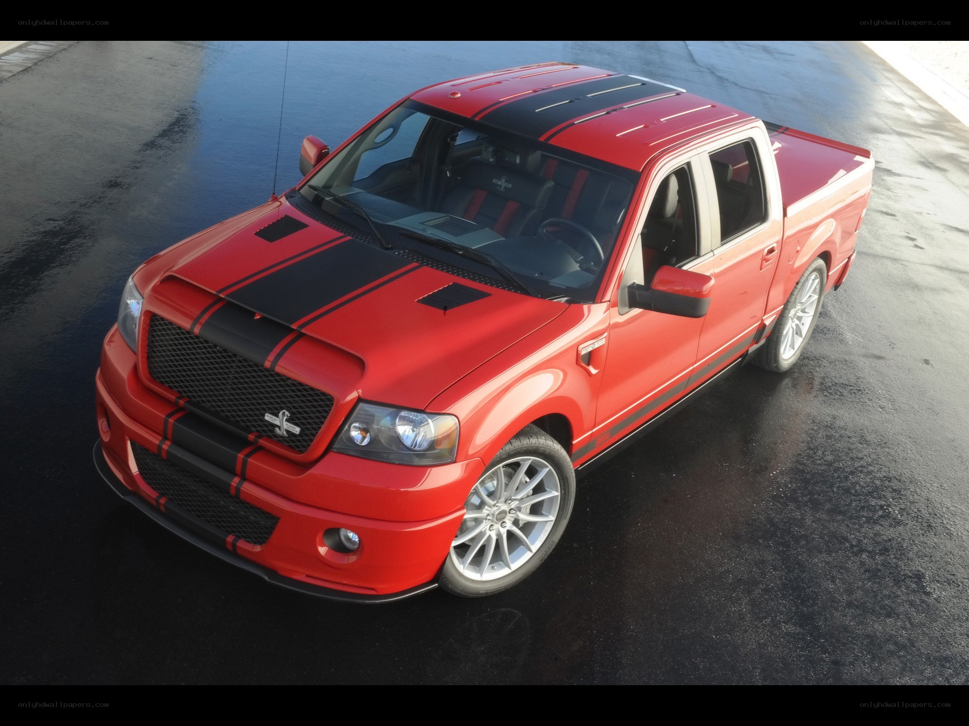 red pickup truck with stripes