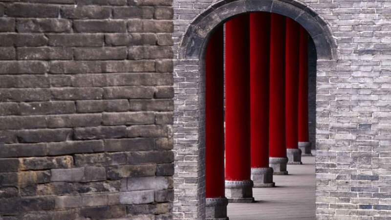 Red Pillars in Corridor