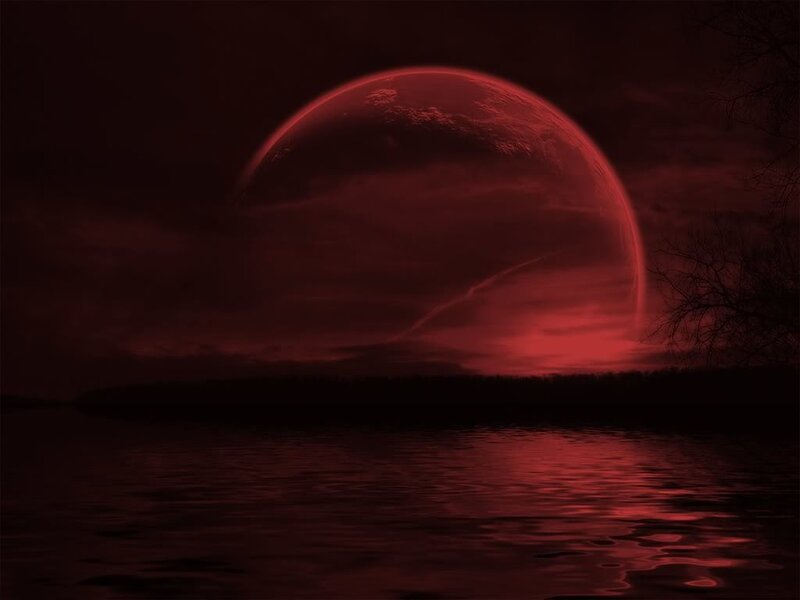 Red planet over water