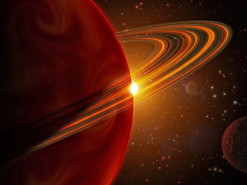 Red planet with rings and moons