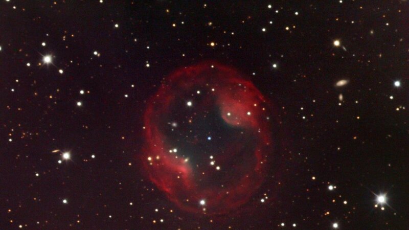 Red planetary nebula in space