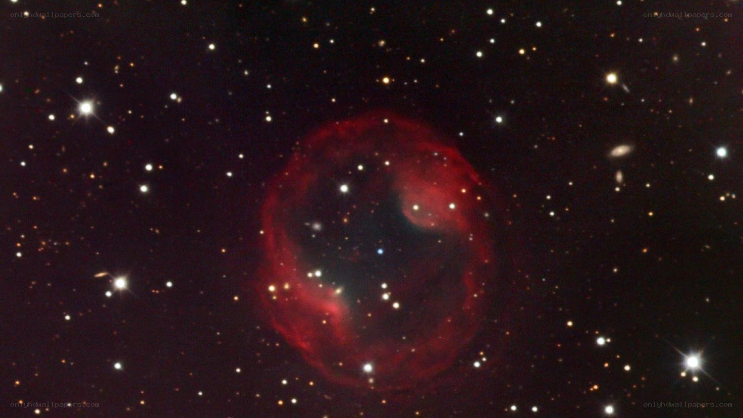 Red planetary nebula in space