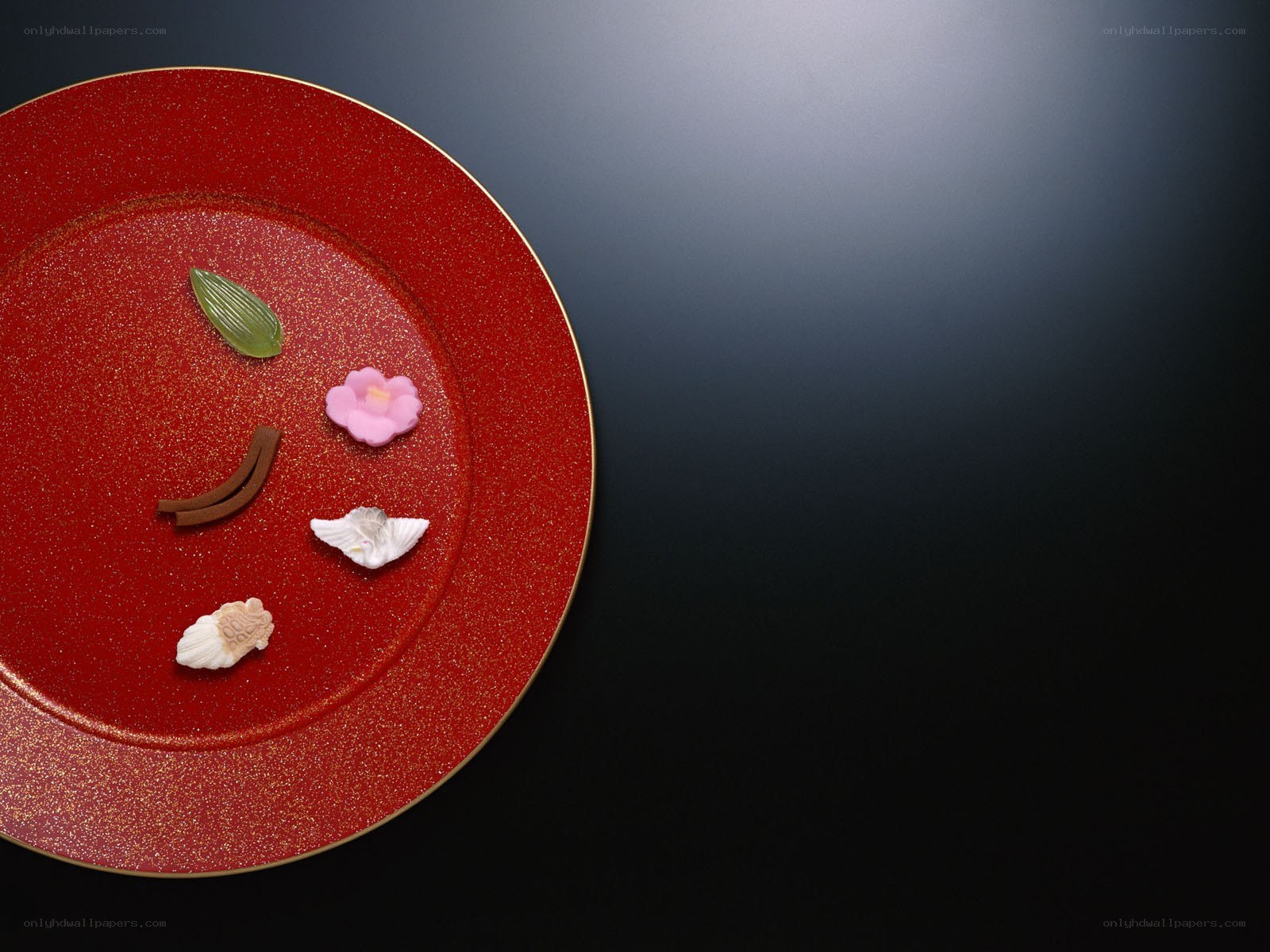 Red plate with Japanese sweets