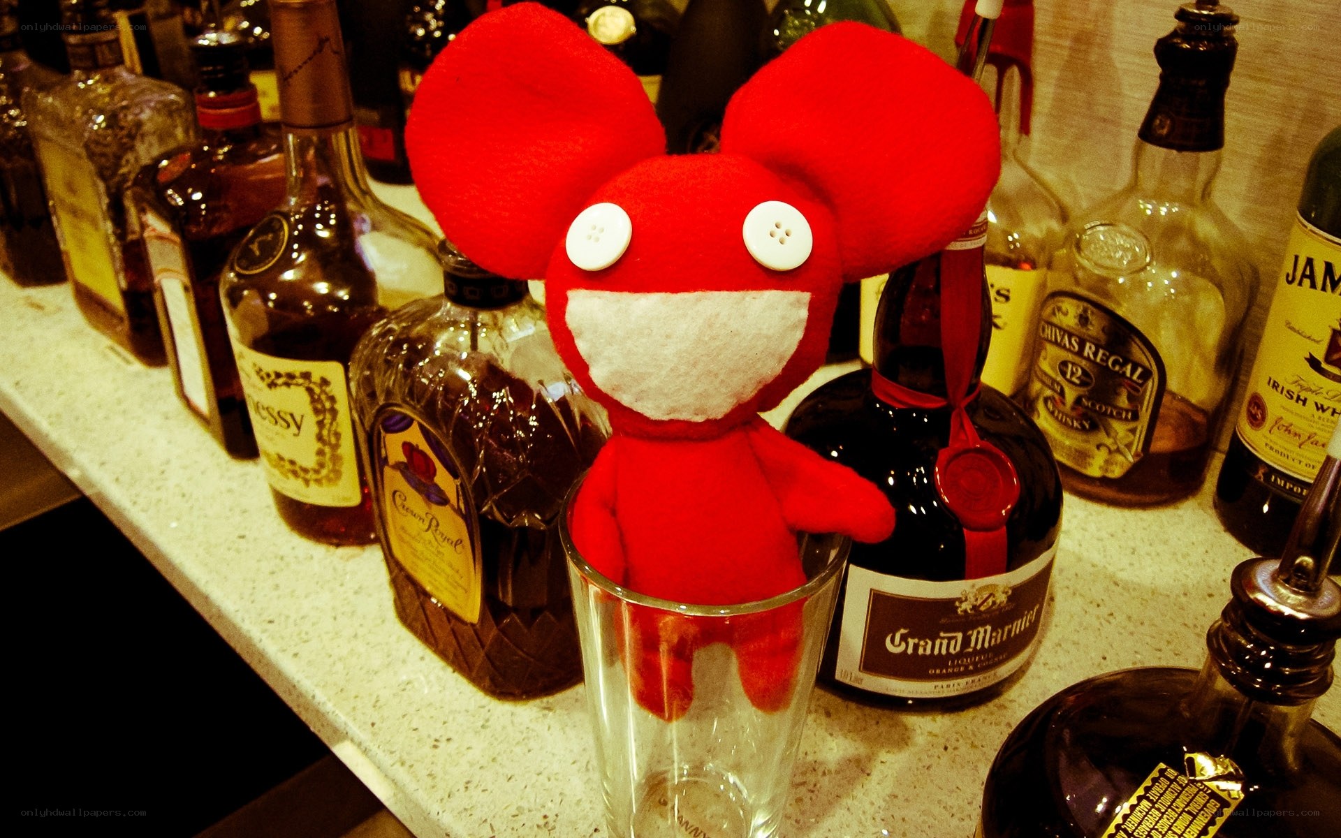 Red plush toy on bar counter